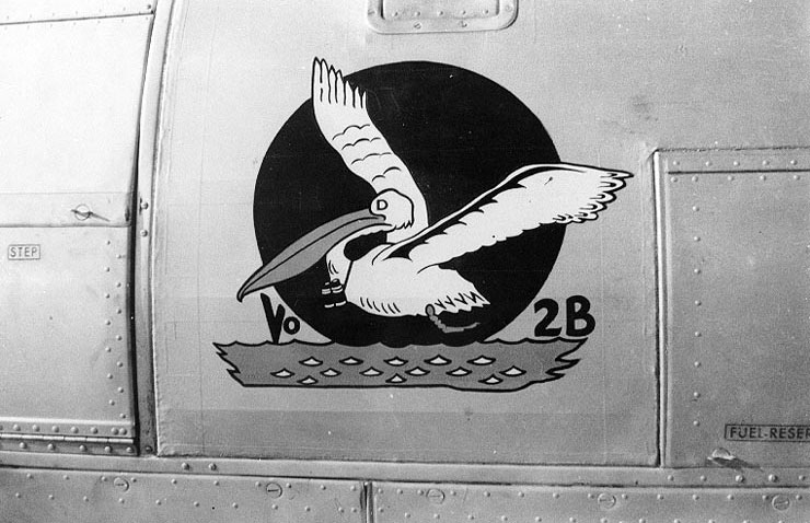 Close-up view of the forward fuselage port side of battleship California's SOC-3 Seagull aircraft, showing the insignia of Observation Squadron Two (VO-2B), 1938