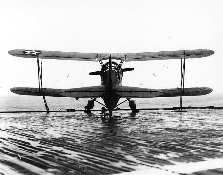 SOC-3A Seagull floatplane of US Navy Scouting Squadron 201 (VS-201) parked on the deck of escort carrier Long Island, 16 Dec 1941, photo 3 of 3