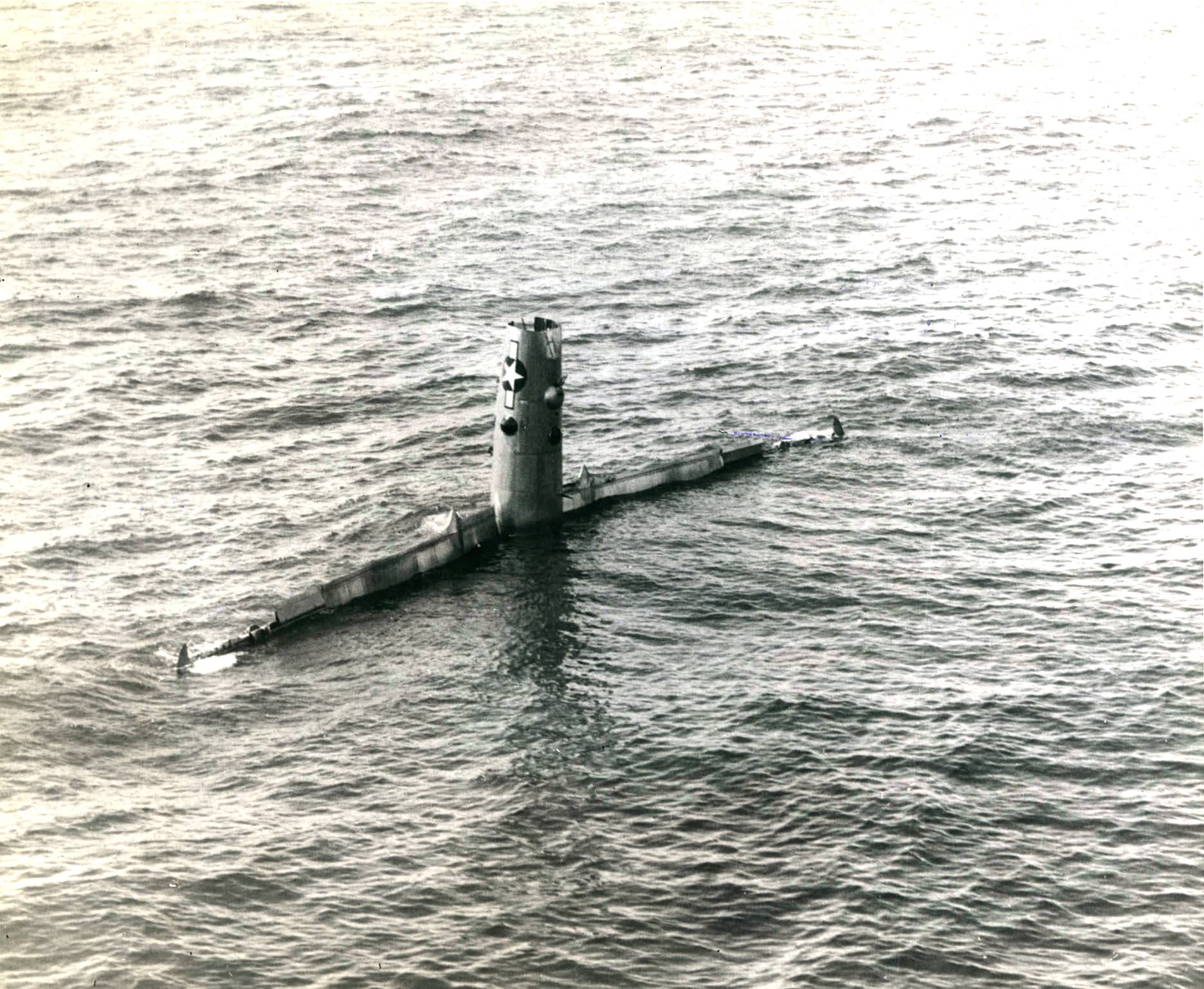B-29 Superfortress bomber 'City of Pittsfield/Two Passes and a Crap' of 39th BG of US 61st BS about to sink after being ditched north of Guam, Mariana Islands, 15 May 1945; she was damaged by flak over Nagoya, Japan