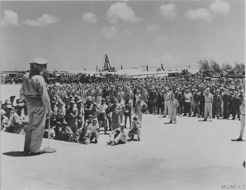 Men gathering on an American bomber base in the Mariana Islands, 1945