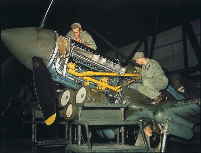 P-40 Warhawk fighter undergoing maintenance, circa 1940s