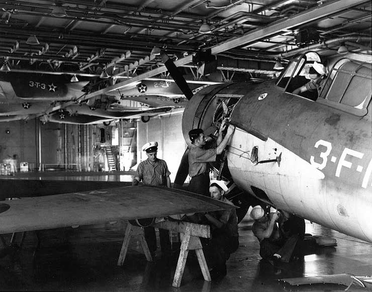F4F-3 Wildcat inside USS Enterprise's hangar deck, 28 Oct 1941; note spare TBD and SBD aircraft hanging overhead