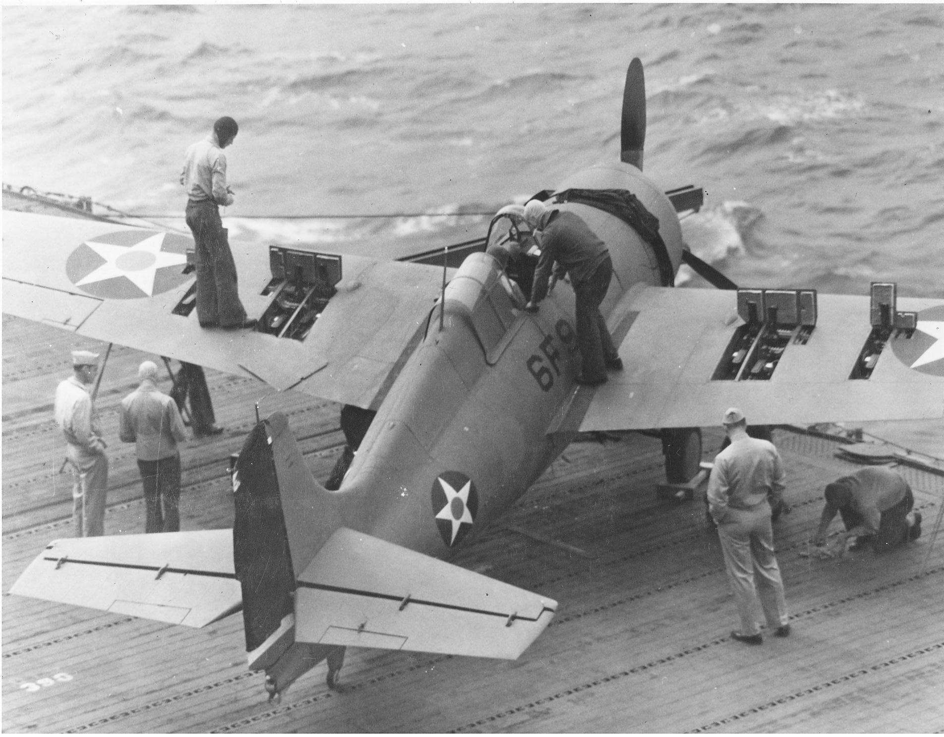 Wildcat of VF-6 testing out machine guns aboard USS Enterprise, 10 Apr 1942