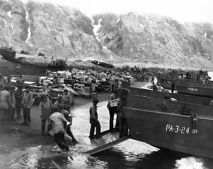 American soldiers unloading landing craft on the beach at Massacre Bay, Attu, Aleutian Islands, 13 May 1943