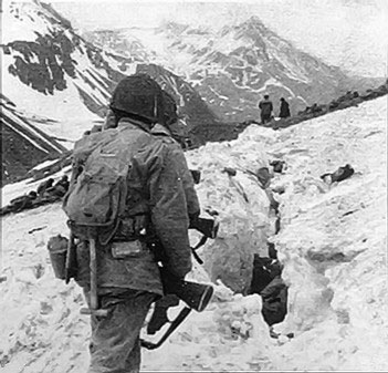 American troops traveling across snow and ice during the Battle of Attu Island, May 1943