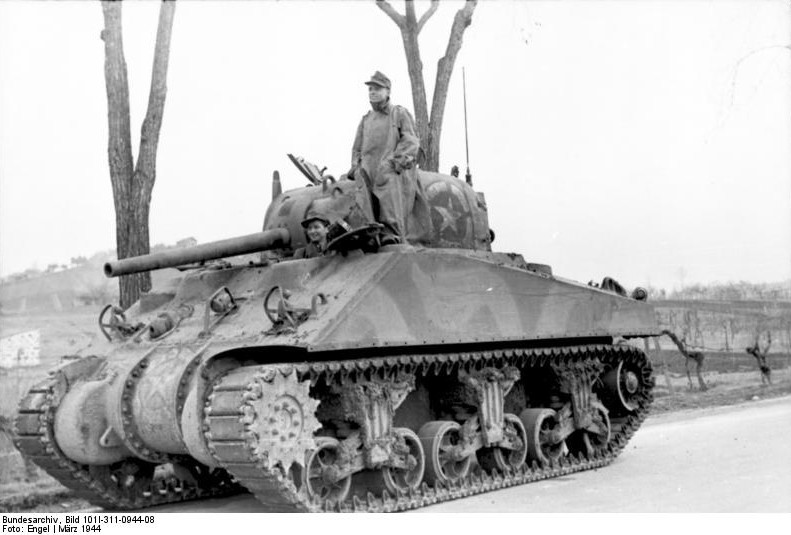 German troops inspecting a captured US M4 Sherman tank, Nettuno, Italy, Mar 1944, photo 1 of 2
