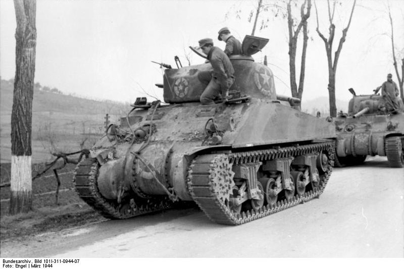 German troops inspecting a captured US M4 Sherman tank, Nettuno, Italy, Mar 1944, photo 2 of 2