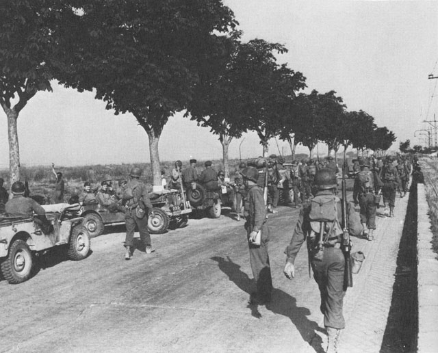 US troops marching along Highway 6 toward Rome, Italy, Jun 1944