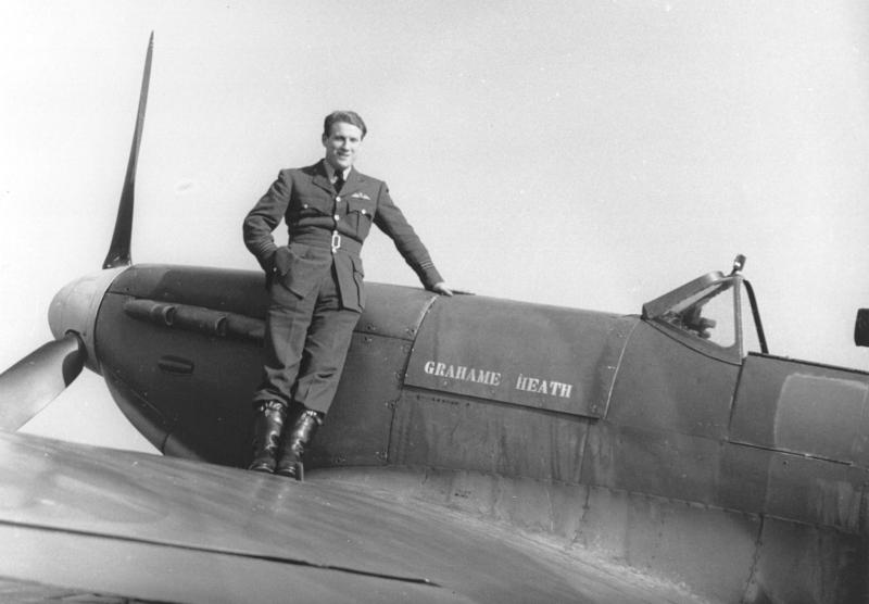 British pilot Barrie Heath of No. 611 Squadron RAF posing with his Spitfire fighter, 1940