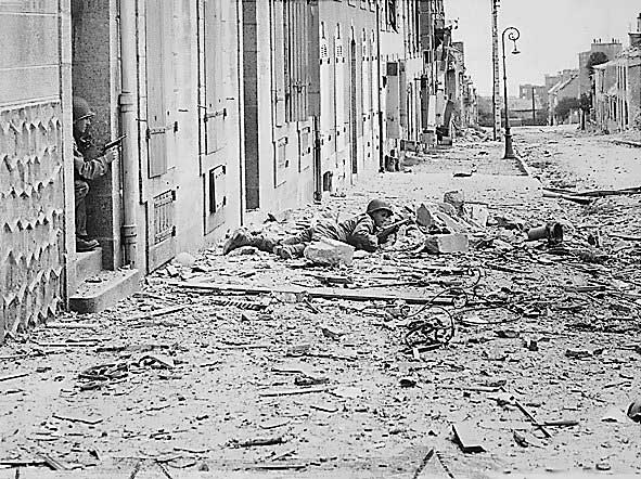 US Army soldiers fighting in the streets of Brest, France during the mop up operations, Sep 1944