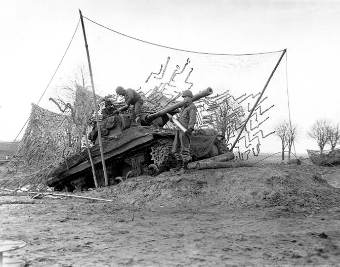 M36 Jackson tank destroyer of Battery C, 702nd Tank Destroyer Battalion, US 2nd Armored Division dug in near the Roer River, Belgium, 16 Dec 1944