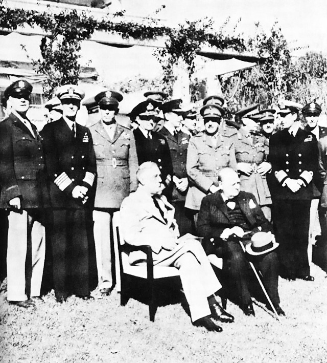 Roosevelt and Churchill at Casablanca Conference, French Morocco 22 Jan 1943; rear row L to R: Gen Arnold, Adm King, Gen Marshall, Adm Pound, Air Chief Marshal Portal, Gen Brooke, Field Marshal Dill, Adm Mountbatten