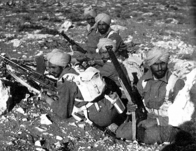 A group of Sikh soldiers of an Indian unit in North Africa during Operation Crusader, late 1941; note Bren machine gun and Lee-Enfield rifles