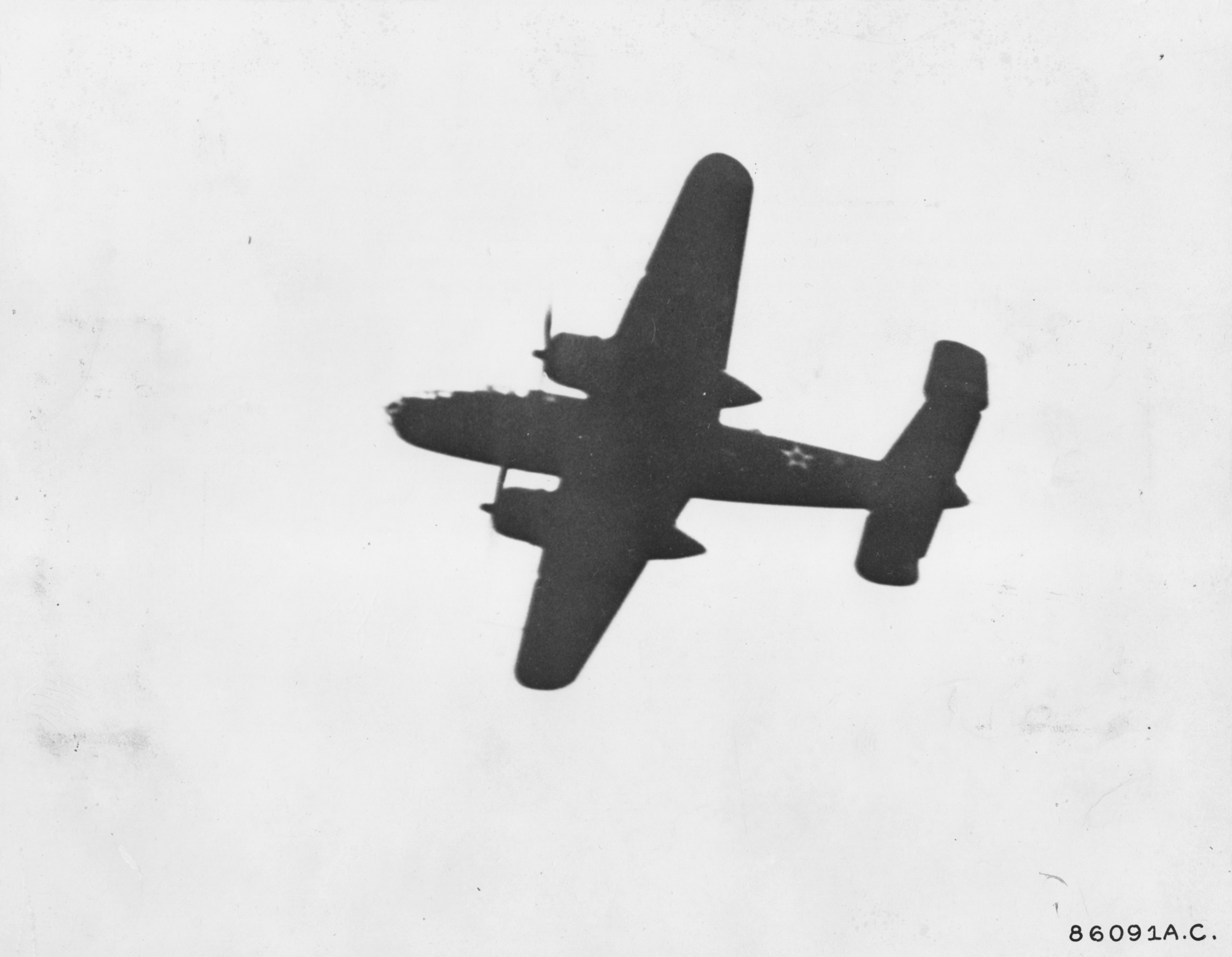 B-25 Mitchell bomber in flight over USS Hornet en route to Japan, 18 Apr 1942