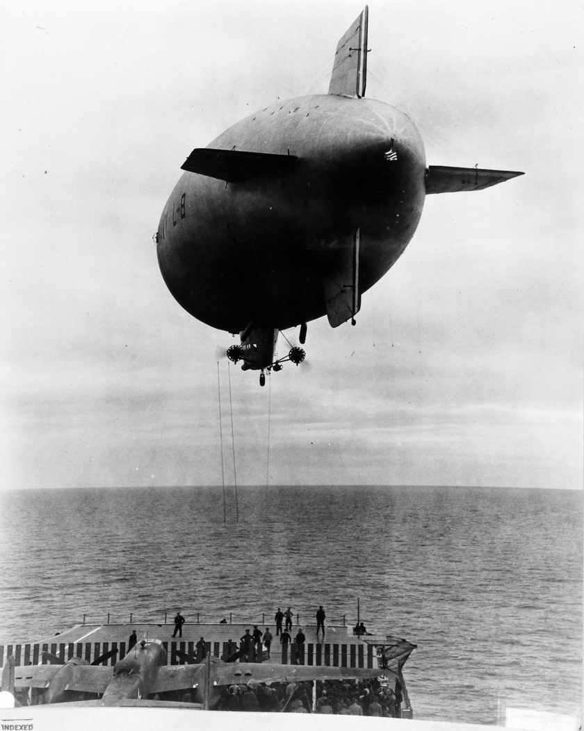 US Navy blimp L-8 delivering 300 pounds of spare parts for B-25 bombers to USS Hornet, off California, United States, 2 Apr 1942