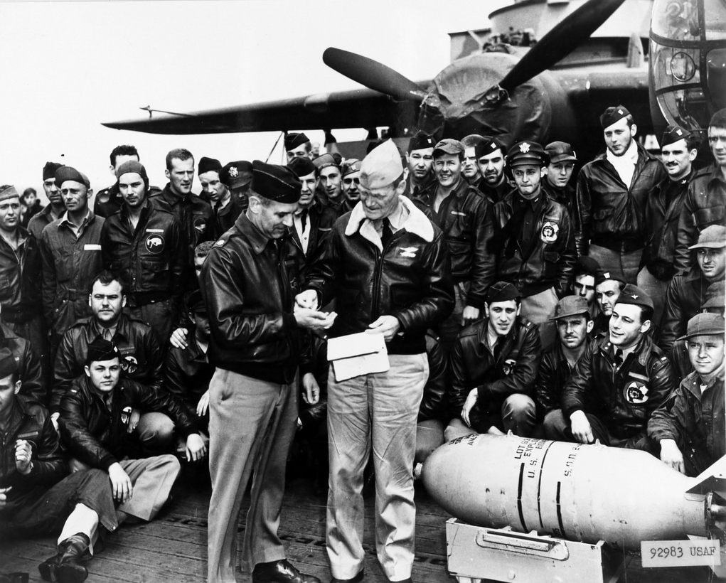 Captain Marc Mitscher speaking with Lieutenant Colonel James Doolittle aboard USS Hornet, 18 Apr 1942, photo 3 of 3