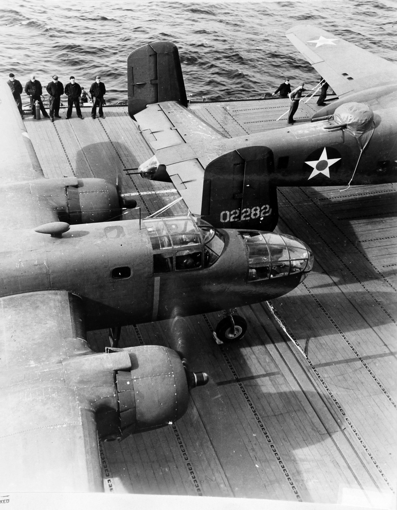 B-25 Mitchell bombers and air crewmen on the flight deck of USS Hornet, Apr 1942, photo 2 of 3