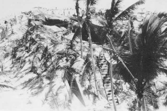 Captured Japanese 8-in gun emplacement, which was previously captured from the British at Singapore; Betio, Tarawa Atoll, 20 Nov 1943; photo 1 of 2