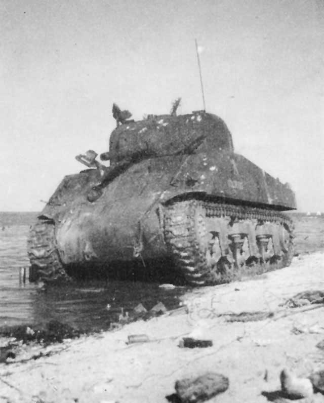 American tank disabled at Betio beach, Tarawa Atoll, Gilbert Islands, 22 Nov 1943