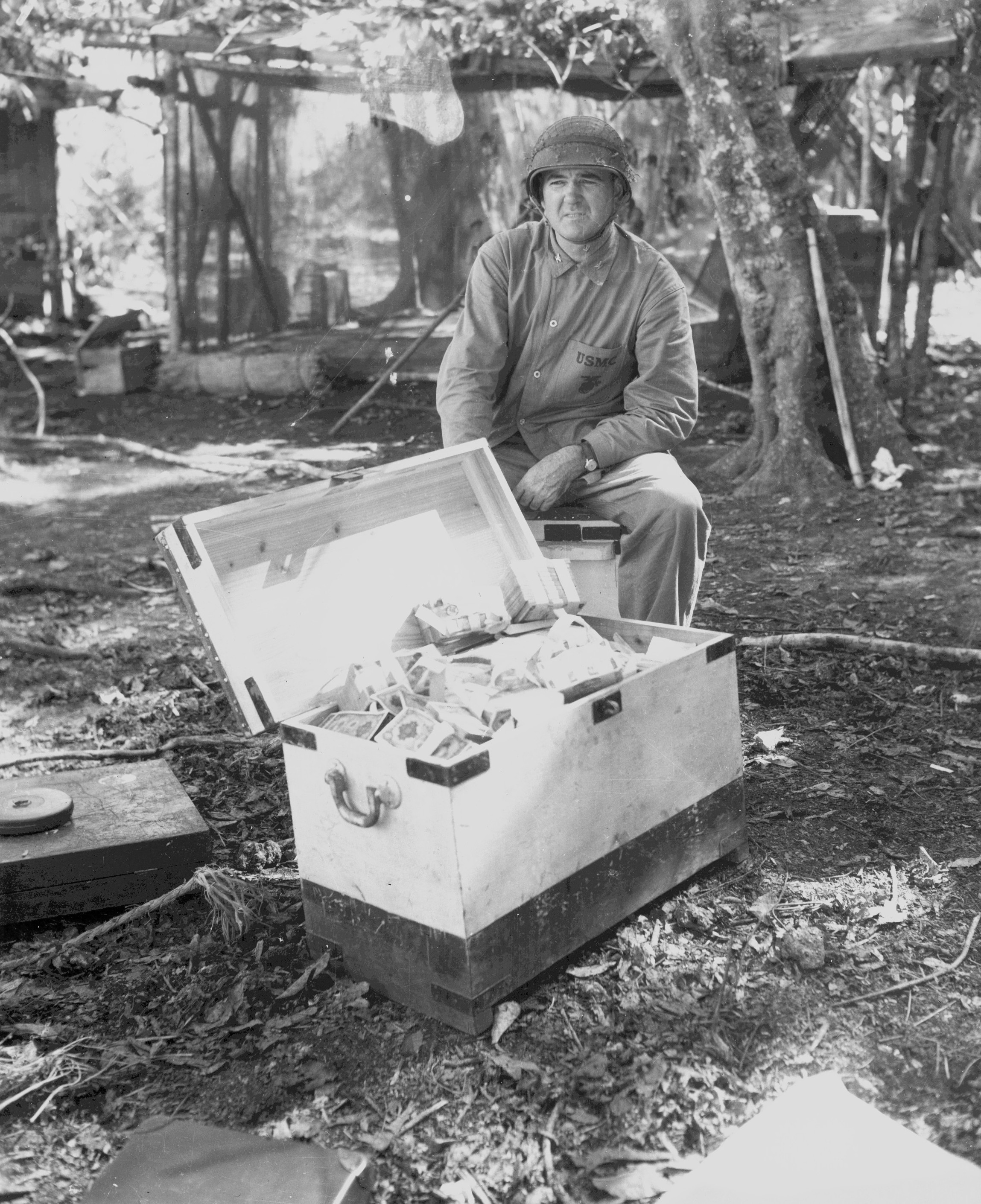 US Marine Colonel Frank Goettge with captured Japanese currency, Guadalcanal, Solomon Islands, Aug 1942
