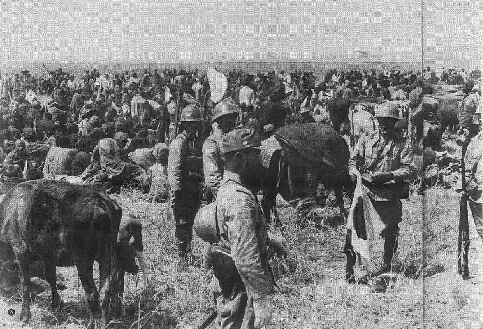 Japanese troops guarding Chinese refugees displaced by war and the Yellow River Flood, China, Jun-Jul 1938