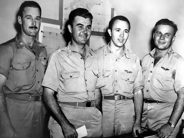 Crew of 'Enola Gay' over Hiroshima, Japan: Maj. Thomas W. Ferebee, bombardier; Col. Paul W. Tibbets, Jr. pilot; Capt. Theodore J. Van Kirk, navigator; Capt. Robert Lewis, officer crew; 5 Aug 1945