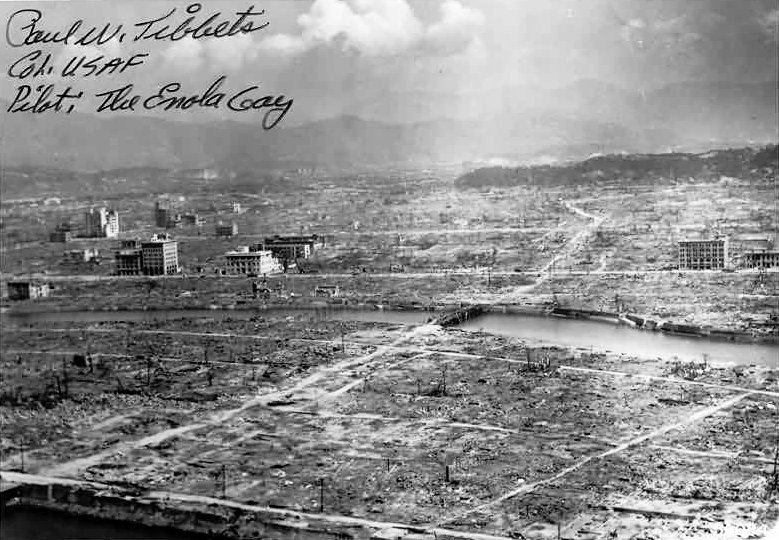Desolated landscape of Hiroshima, Japan after the atomic detonation, post-war, photo 1 of 2; note Paul Tibbet's autograph