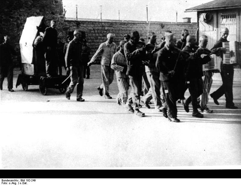Mauthausen Concentration Camp prisoner Hans Bonarewitz being pulled in a cart prior to his execution, Austria, 30 Jul 1942