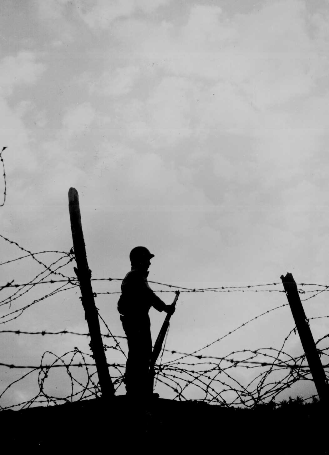 [Photo] Pfc Angelo B. Reina of the 391st Infantry Regiment guarded his ...