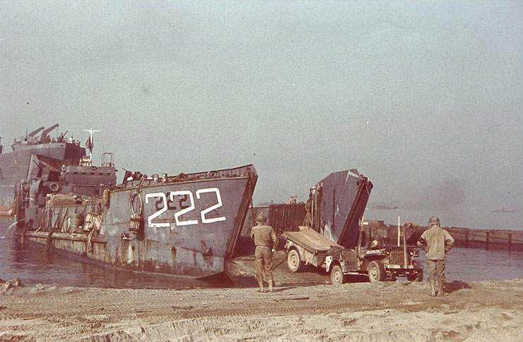 LCT-222 landed a jeep onto Salerno beach, Italy, Sep 1943; note LST-1 in background