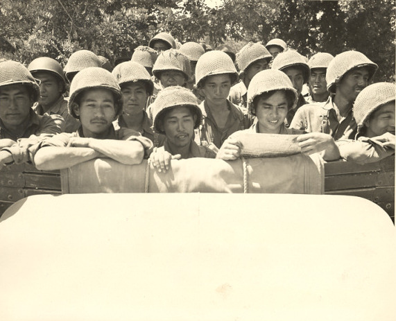 Japanese-American troops of 100th Infantry Battalion of US 442nd Regimental Combat Team leaving for regimental reserve after 16 days of fighting, Castellina Sector, near Livorno, Italy, 15 Jul 1944