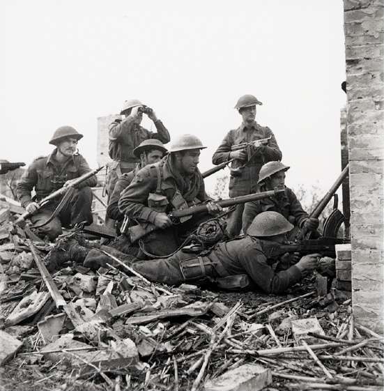 Canadian 48th Highlanders infantry regiment in Italy, 10 Dec 1943; the man with binoculars was Platoon Commander Mcdonald