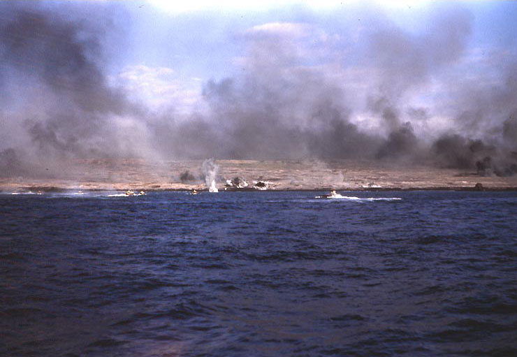 As shells exploded on Iwo Jima beach, LVTs approached, 19 Feb 1945