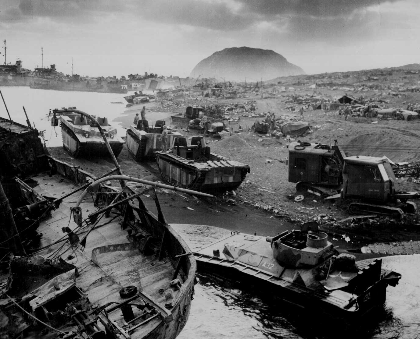 Destroyed American amtracs and other vehicles on beach of Iwo Jima, Japan, Feb-Mar 1945