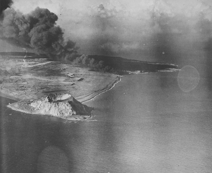 Airfield Number Two burning after American air raid, Iwo Jima, early 1945