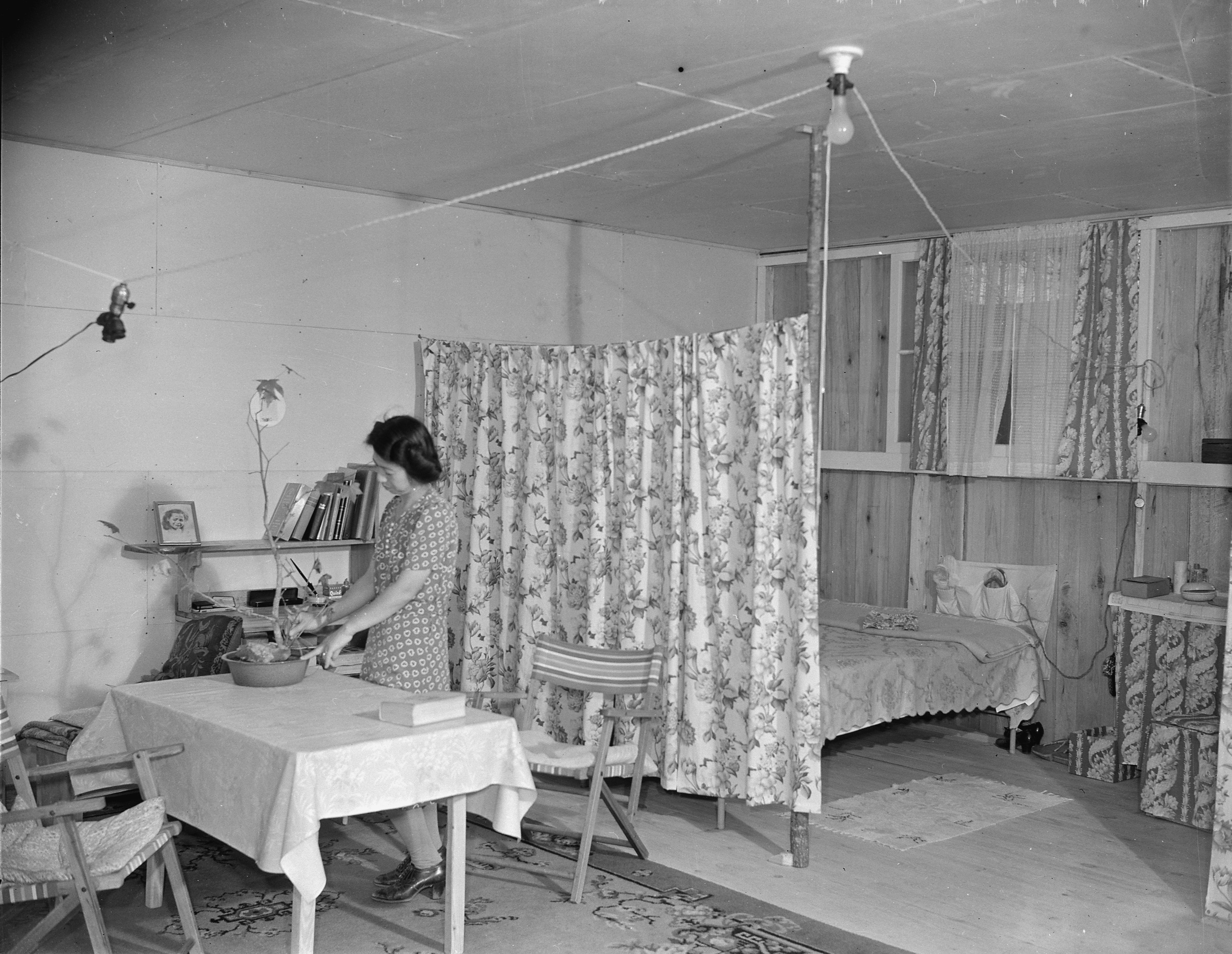 View of the interior of a typical barracks home at Jerome War Relocation Center, Arkansas, United States, 17 Nov 1942