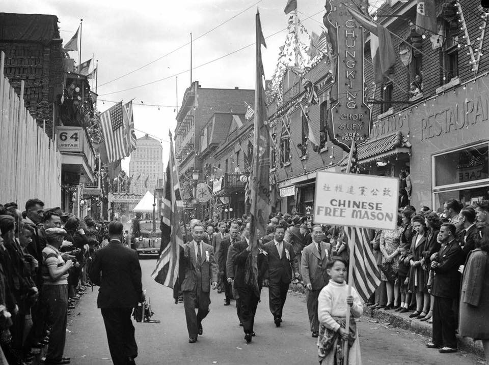 Chinese Free Mason members in the victory parade, De la Gauchetière Street, Montreal, Canada, 2 Sep 1945