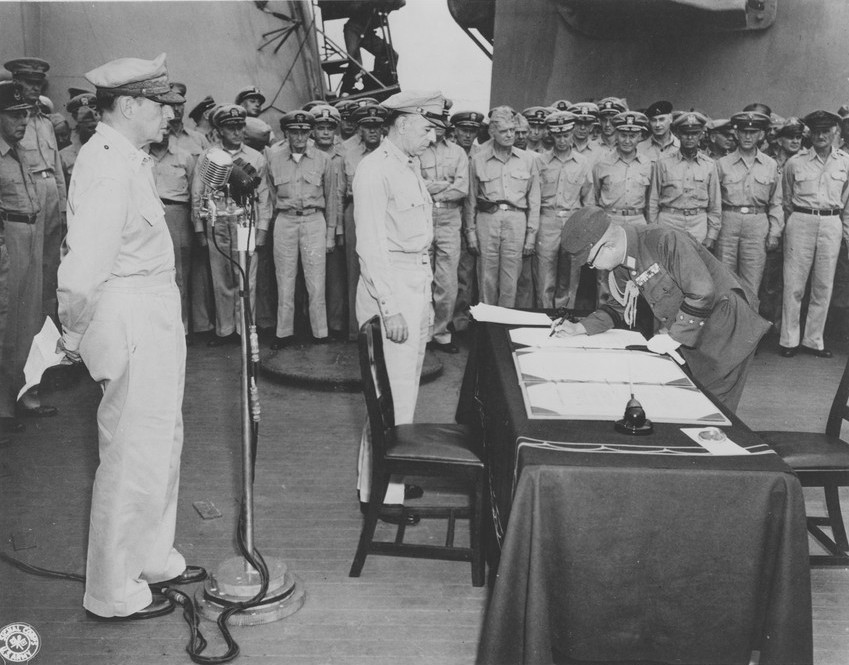 General Yoshijiro Umezu signing the instrument of surrender, Tokyo Bay, Japan, 2 Sep 1945, photo 3 of 4