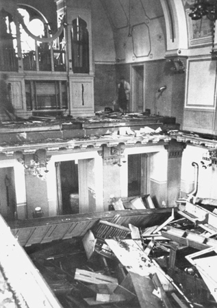 Prayer books scattered on the floor of the choir loft in the Zerrennerstraße synagogue in Pforzheim, Germany, circa Nov 1938, photo 2 of 2