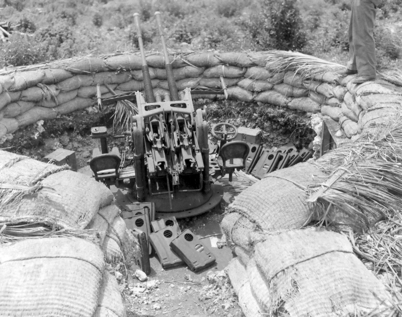 Japanese 25mm anti-aircraft gun in a 13ft revetment or emplacement located on the northern side of the Agana Airfield, Guam, Mariana Islands, 5 Oct 1944