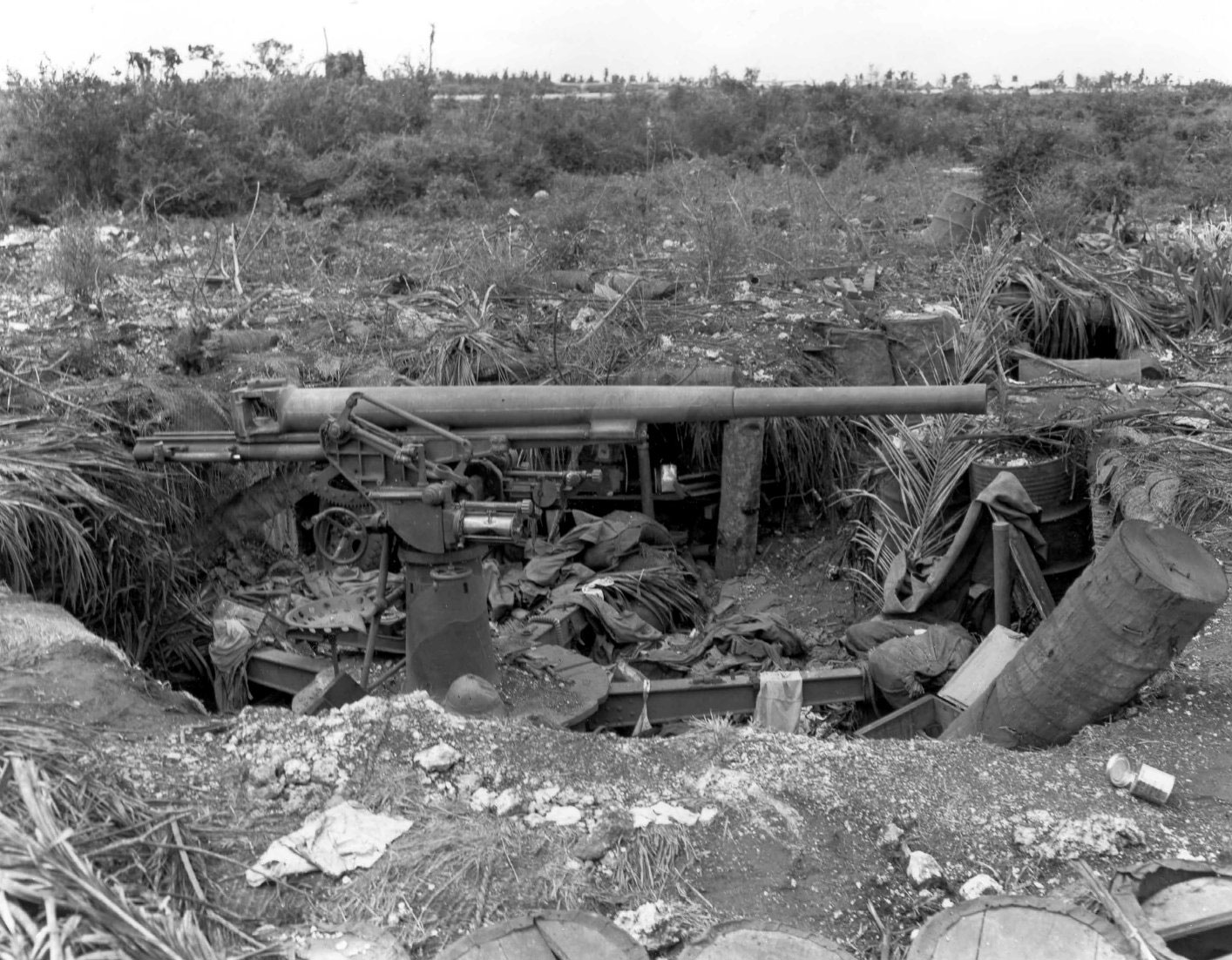 Japanese 75mm Type 88 anti-aircraft battery on the old US rifle range near Marine Barracks, Sumay, Guam, Mariana Islands, 5 Oct 1944