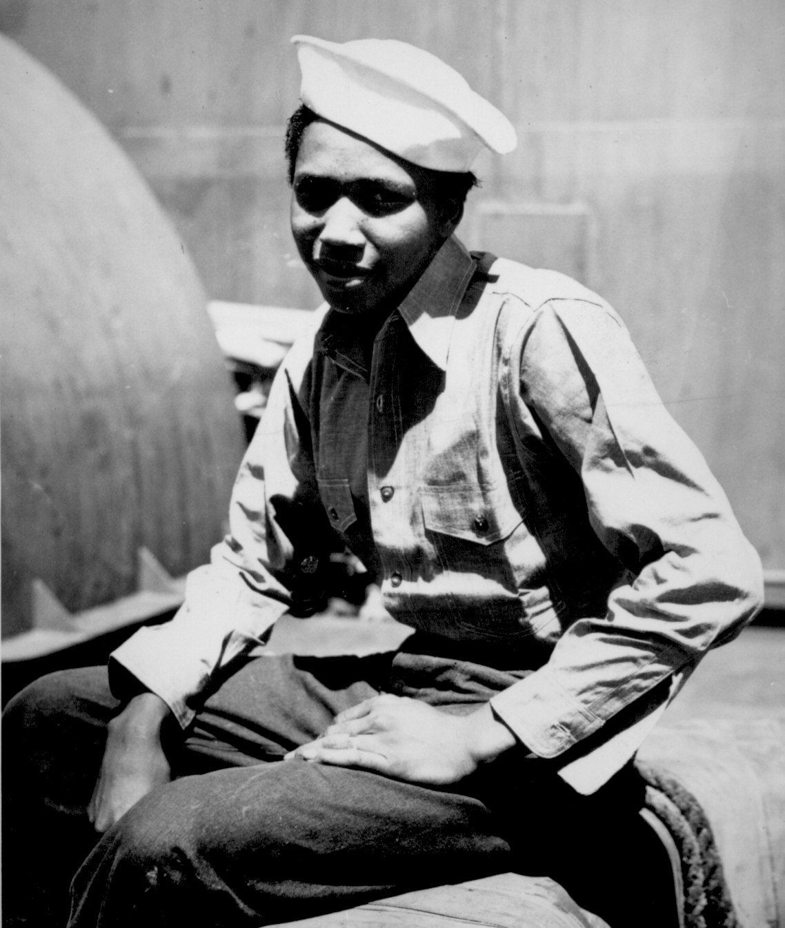 African-American US Coast Guardsman Aught Guttery, Jr., Steward's Mate 1st Class, on a ship off Guam, Mariana Islands, circa mid- or late-1944