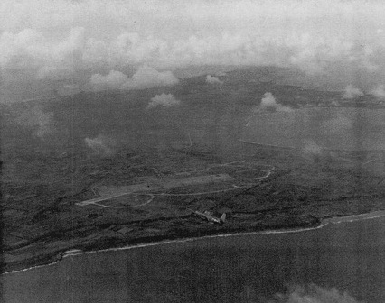 TBF aircraft from USS Coral Sea flying over Aslito Airfield, Saipan, Mariana Islands, 20 Jun 1944