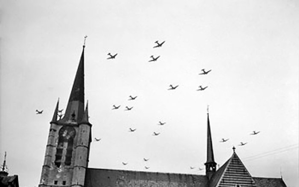 American C-47 aircraft flying over Gheel in Belgium on their way to the Netherlands for Operation Market Garden, 17 Sep 1944