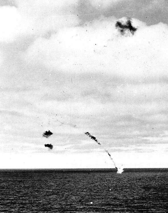 A B5N torpedo bomber shot down by Yorktown's anti-aircraft fire crashing into the sea, 4 Jun 1942, photo 1 of 2