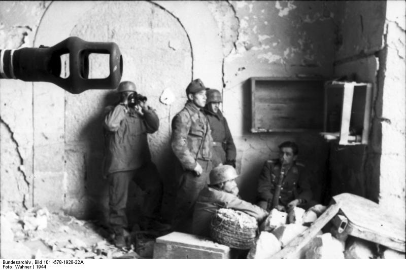 German paratroopers in the cellar of a destroyed house in Cassino, Italy, 1944, photo 2 of 3