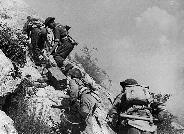 Polish troops carrying ammunition to the front lines, near Cassino, Italy, May 1944
