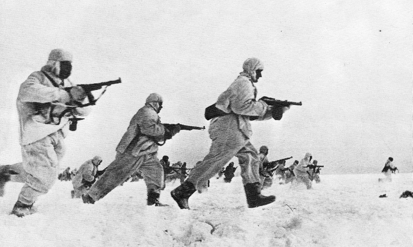 Soviet troops fighting in snowy terrain near Moscow, Russia, late 1941