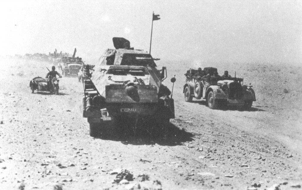 German vehicles of 21st Panzer Division on the move in North Africa, 1942