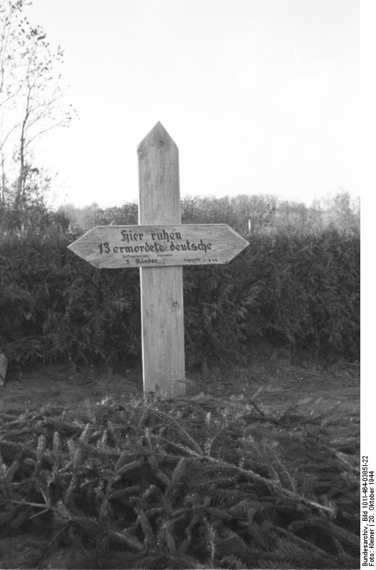 Grave marker for 13 German civilians killed by Soviets, Nemmersdorf, East Prussia, Germany, late Oct 1944, photo 1 of 2